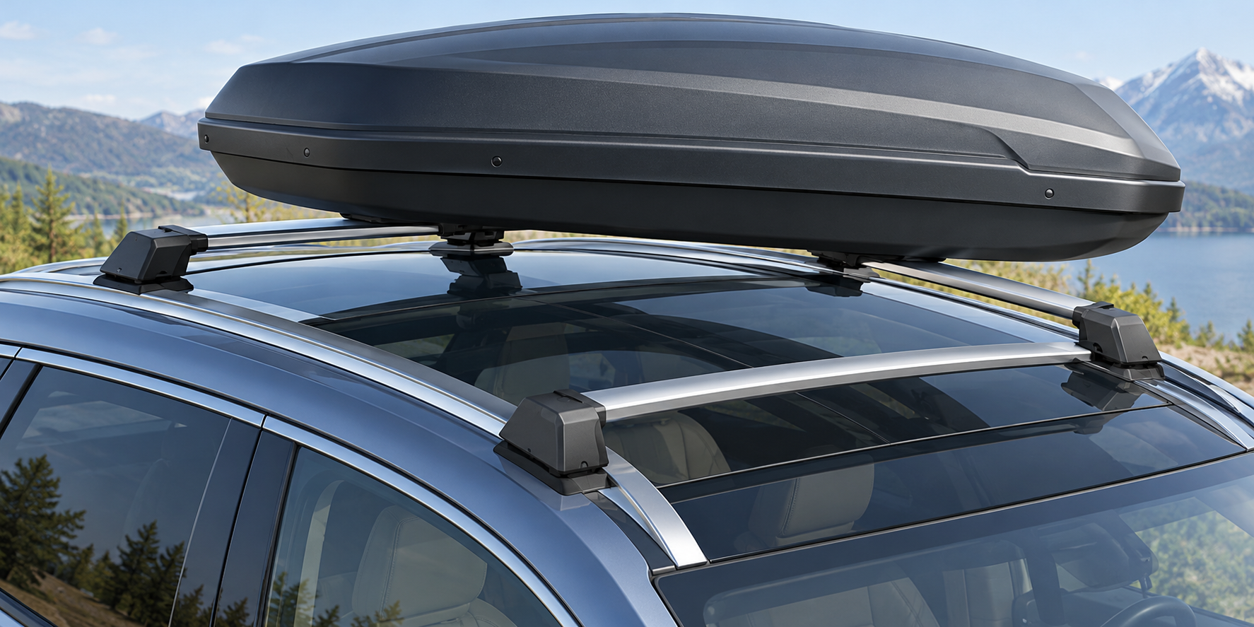 A cargo box supported by rack bars and mounts while remaining clear of the glass roof panel.